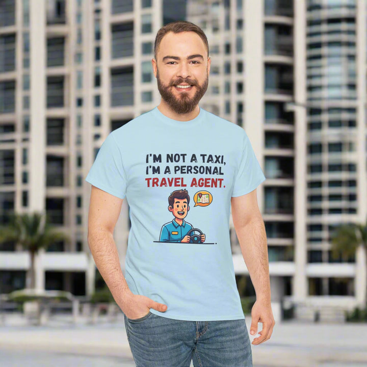 Man wearing a light blue t-shirt with a humorous graphic and text on a white background