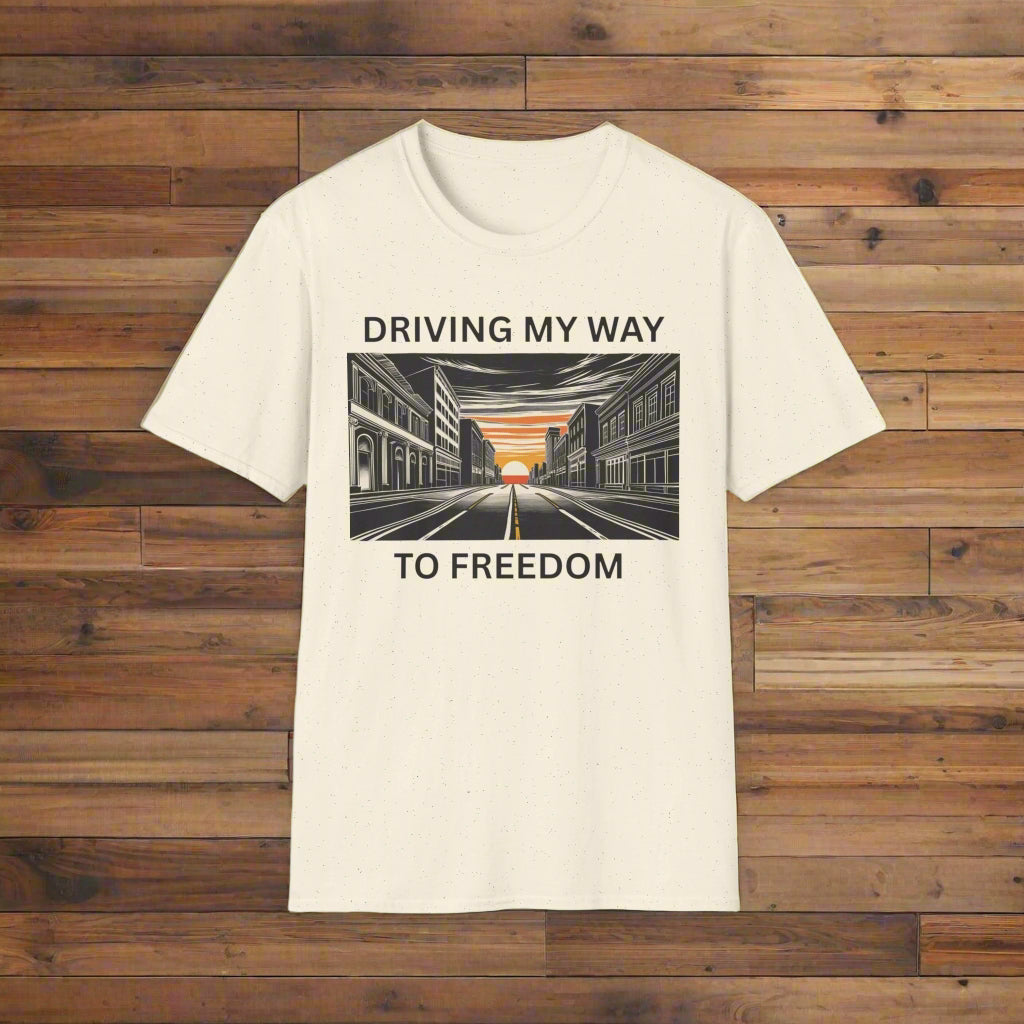 Beige t-shirt with a graphic design and text on a white background that says driving my way to freedom