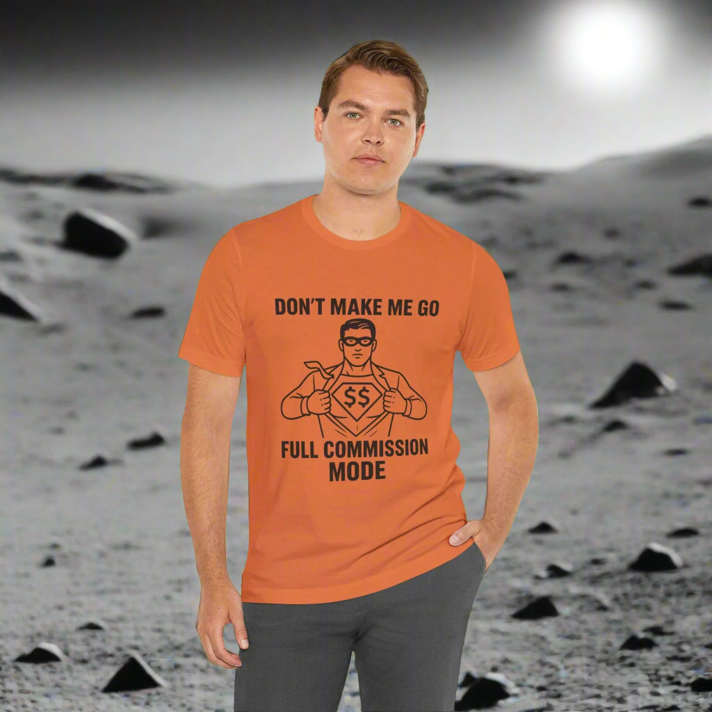 Man wearing an orange t-shirt with a superhero graphic and text on a white background