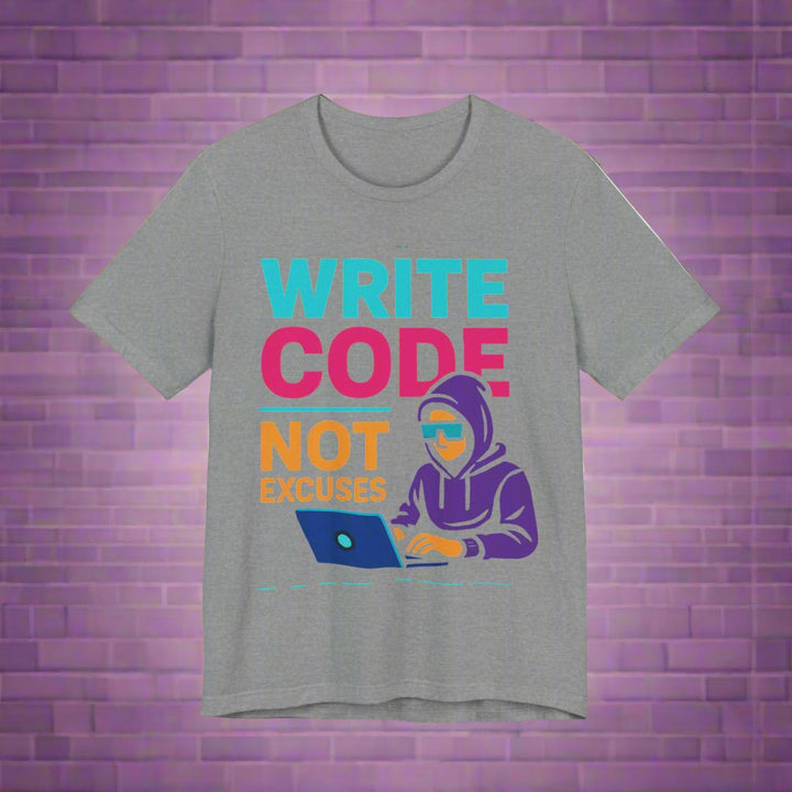 Gray t-shirt with colorful text and graphic of a person coding on a laptop that says write code not excuses